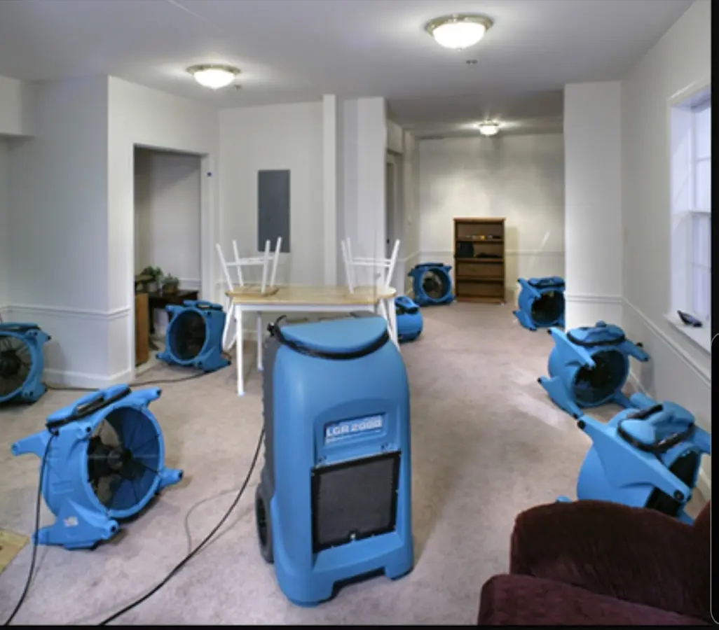 Air movers and dehumidifier setup for Water Extraction & Removal in Houston
